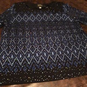 A black and blue bejeweled shirt